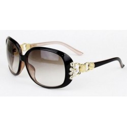 نظارة شمسية نسائية بذراع ذهبي مرصع بقط الكريستال